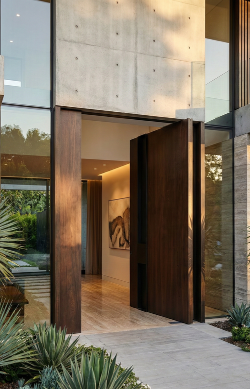 Timber-look cast aluminium pivot door with realistic wood grain finish, luxury modern home entrance